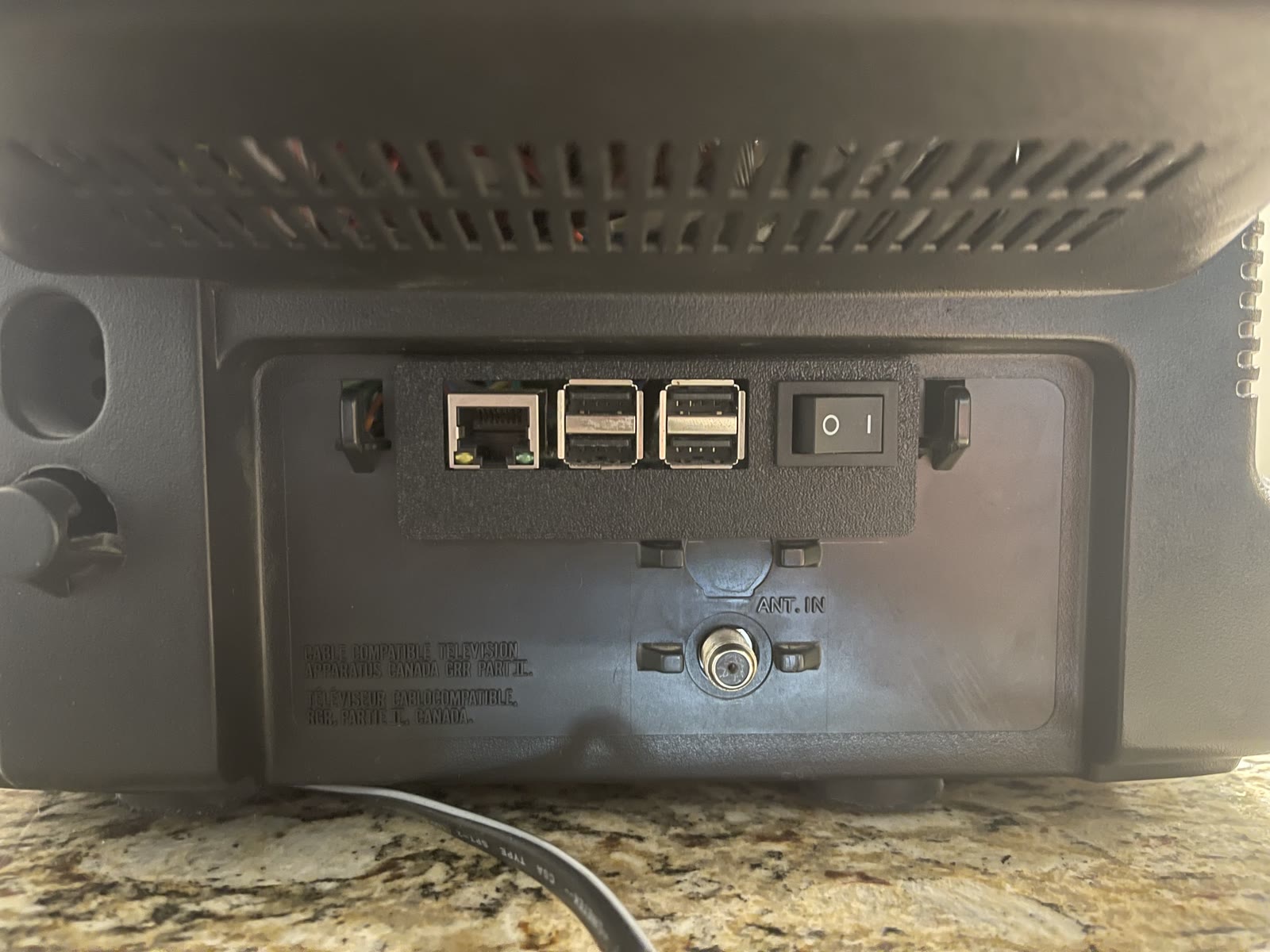 Custom back panel integrating Ethernet, USB, and power