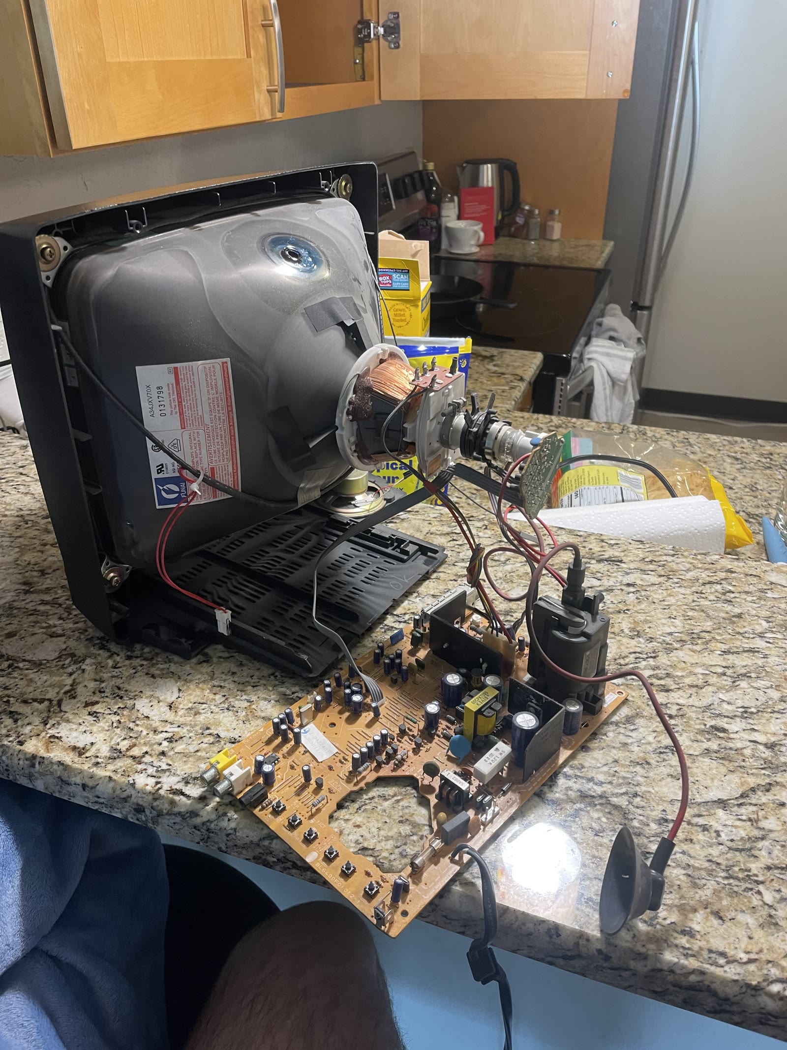 CRT teardown showing the original main board