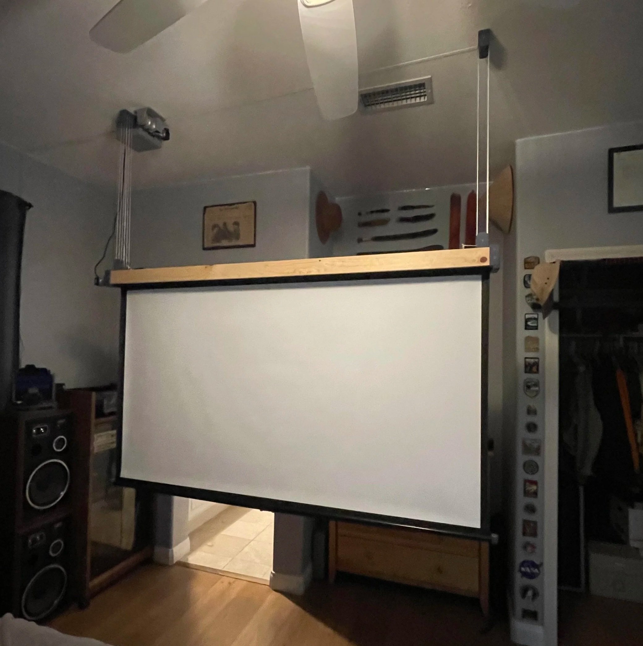 Voice-Activated Retractable Projector Screen